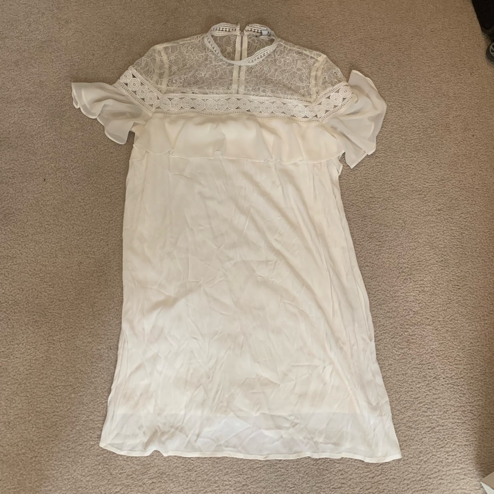 Express white lace neck dress with flutter sleeves